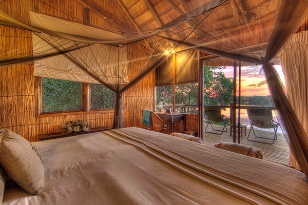 Xugana Island Lodge - Chalet Zimmer