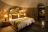 Camp Kipwe - Bungalow Schlafzimmer