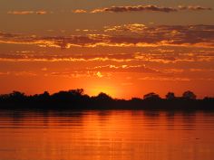 Cascade Island Lodge, Sonnenuntergang über dem Zambezi