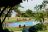 Mboyti River Lodge - grosser Garten mit Pool Mboyti River Lodge - grosser Garten mit Pool