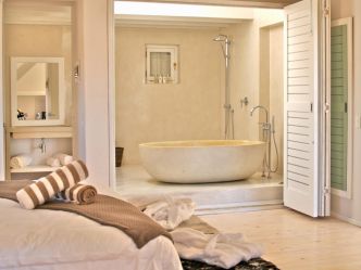 Strandloper Boutique Hotel - Nature Suite Schlafzimmer & Bad Strandloper Boutique Hotel - Nature Suite Schlafzimmer & Bad