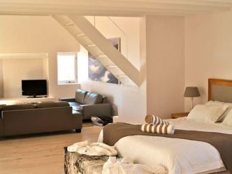 Strandloper Boutique Hotel - Nature Suite Schlafzimmer & Lounge Strandloper Boutique Hotel - Nature Suite Schlafzimmer & Lounge